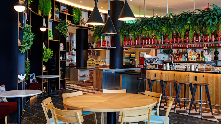 A restaurant's room with a bar in the middle