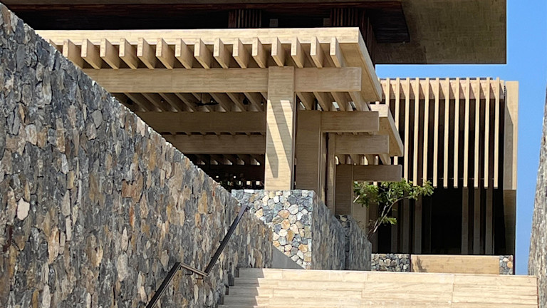 A stone stairs leading up to a building