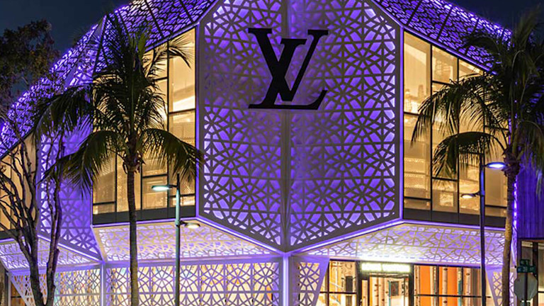 Louis Vuitton store lit up at nighttime
